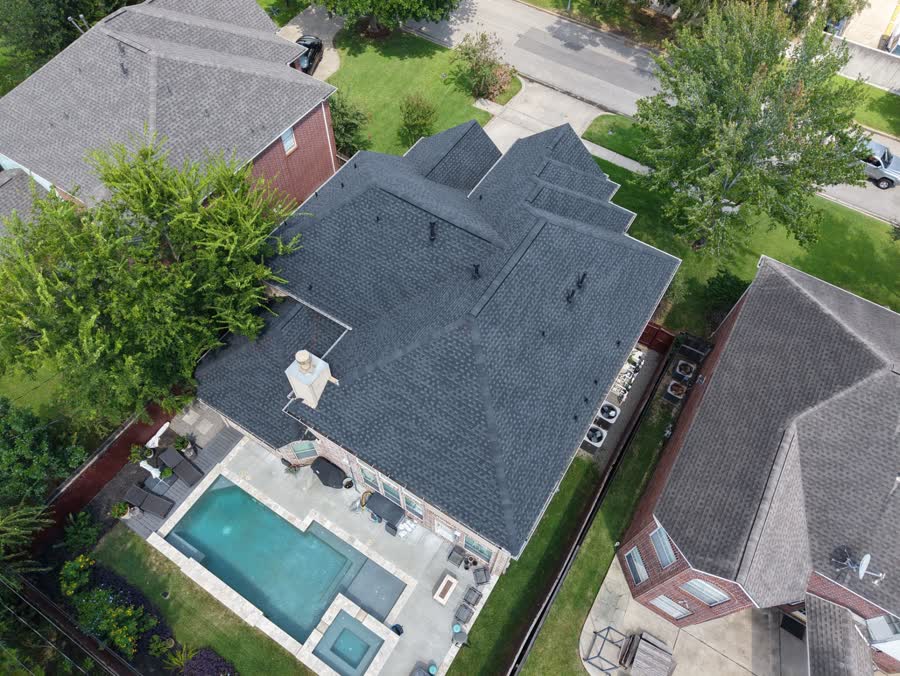 Charcoal Designer Shingles — Pool Home Re-Roof